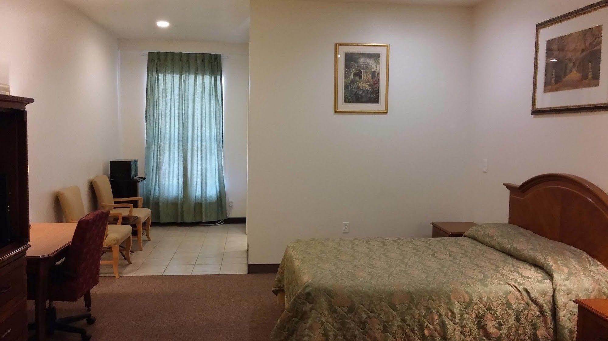 Country Regency Inn & Suites Manvel Eksteriør bilde